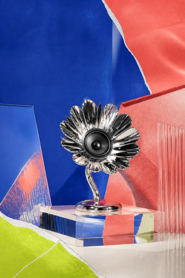 Portrait Feed composition for a chrome floral speaker campaign